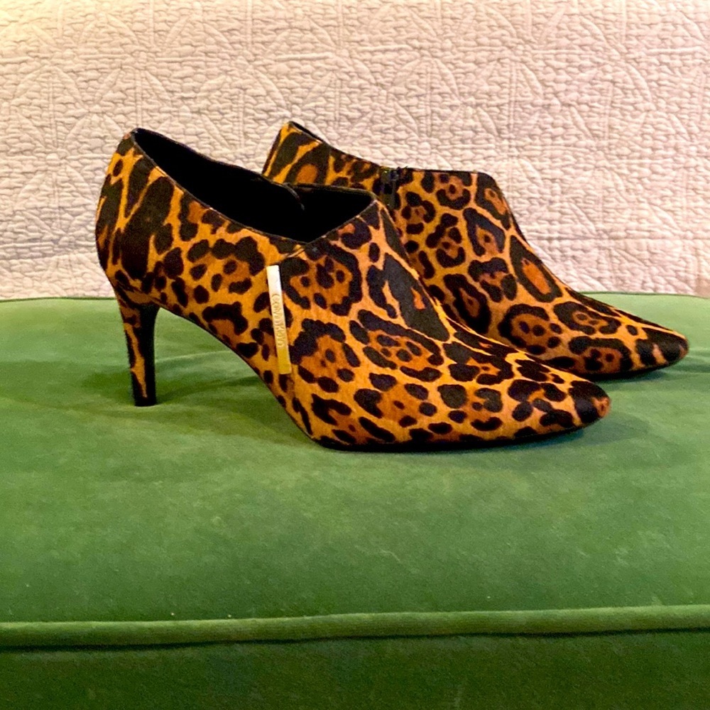 Calvin Klein booties. NWT. Size 9